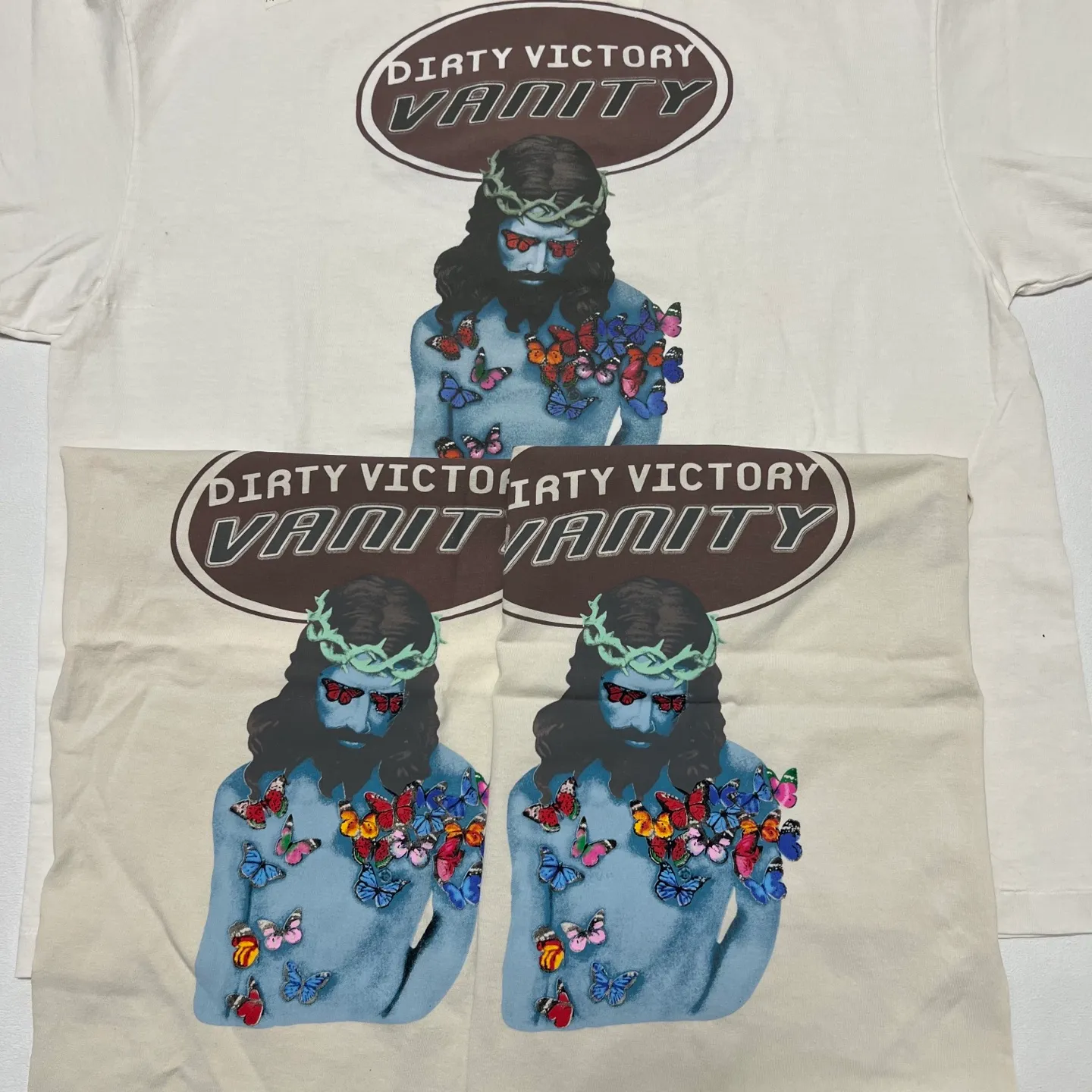 Printing proofing SAINT Mxxxxxx VANITY SS TEE/WHT Jesus butterfly printed short-sleeved off-white S-XL cylindrical fabric without side seams 220g high weight OE yarn ⚠️Note: It is almost meaningless if it is not a cylindrical fabric Customized main mark/wash mark/little angel anti-counterfeiting label Original-level printing factory Top purchasing level